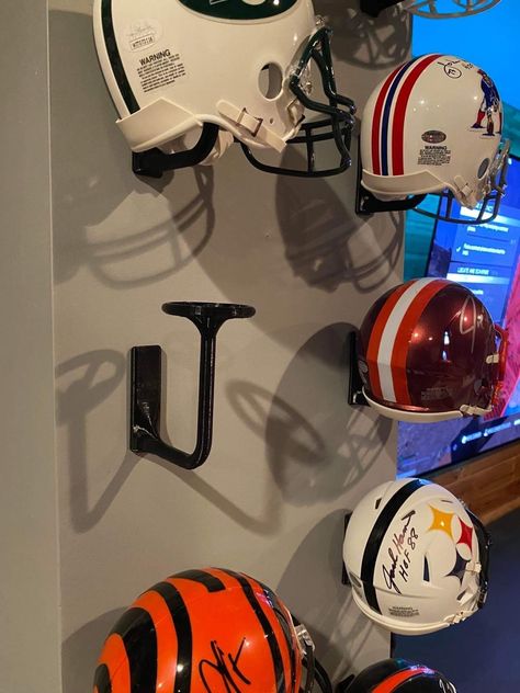 3D Printed PLA plus mini helmet holder.   Make any man cave, room, office, garage look amazing!   Sticks on with command 3m tape INCLUDED. Many color options available! Thank you for looking.   Will have large helmet holders and screw in mini holders available soon. Football Office Decor, Football Helmet Wall Display, Mini Football Helmet Display, Minnesota Vikings Man Cave, Sports Man Cave Ideas Basement, Mini Helmet Display Ideas, Classy Sports Man Cave, Man Cave Sports Room, Football Man Cave Ideas