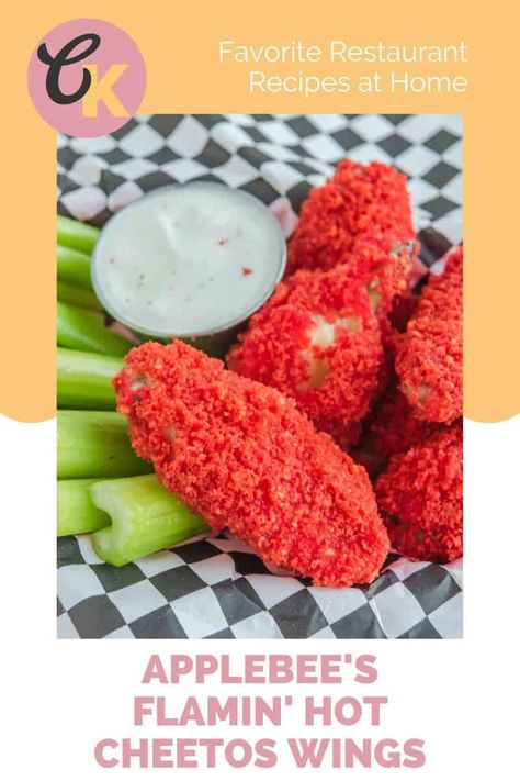 Applebee’s Flamin' Hot Cheetos Wings are incredibly tasty and great for an appetizer or dinner. Get the easy copycat recipe and find out how to make the best chicken wings coated with crushed Flamin Hot Cheetos. Chicken wings are breaded and baked until crispy. Serve these flaming hot wings with celery sticks and ranch or blue cheese dressing. They’re great for game day snacking and sure to be a favorite. Hot Cheetos Wings, Hot Cheetos Chicken, Cheetos Chicken, Applebees Recipes, Wings At Home, Flamin Hot Cheetos, The Best Chicken Wings, Best Chicken Wings, Spicy Queso