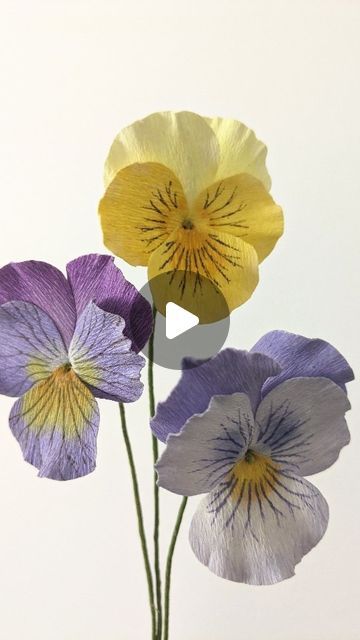 Paper Garden on Instagram: "I've been experimenting with different ways and materials to make Pansy flowers - this is the latest experiment and I think this is it 💜 now I just need to add the calyx and the leaves and they are ready, so expect more pansy posts soon😅  A question to you - would you be interested to learn how to make these? I'm anticipating whether to make a tutorial on them and would love to hear your opinion 💜  #crepepaperbotanicals #creppapirblomster #crepepaperflowerart #crepepaperflowers #paperart #paperbotanicals #diycrafts #papercraft #paperpansies #paperflowercreations #paperflowers #pansyflower" Fineliner Flowers, Paper Pansies, Paper Botanicals, Crepe Paper Flowers Diy, Paper Garden, Pansy Flowers, Paper Flower Art, Paper Leaves, Crepe Paper Flowers