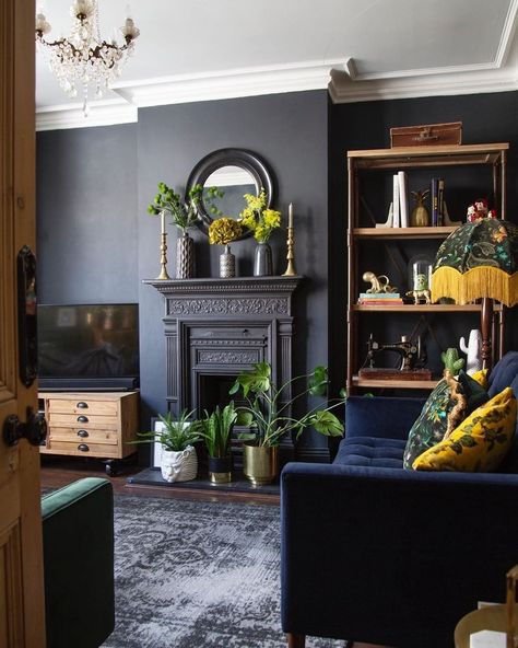 Painting a room black doesn't mean that it will automatically feel gothic. These easy tips and tricks will help you pull off this daring color. Dark Living Room Ideas, Painting A Room, Victorian Living Room, Black Rooms, Dark Living Rooms, Black Living Room, Room Black, Dark Interiors, Blue Living Room