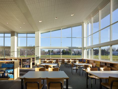 The signature two-story library redefines the existing building aesthetic and also allows for expansion of the building to accommodate school growth. [KCBA Architects] School Lunchroom, School Building Design, Building Aesthetic, Only Aesthetic, Aesthetic School, School Interior, Library Aesthetic, School Cafeteria, School Daze