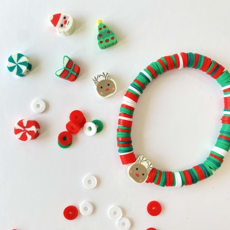 These Christmas heishi disc bead bands are just perfect for celebrating this magical season. Although one size, these bracelets are really flexible to wear, due to their durable and elasticated nature. Each cute Christmas charm is chosen at random with each order. These bracelets make great gifts, and are on offer with BUY 3, GET A 4th FREE! ★ Christmas Heishi Band Product Details★ - Polymer clay heishi disc beads 6mm diameter - Hand-spun on to a clear elastic thread. - 6 Christmas-themed charms Disc Bead Bracelet, Santa Tree, Red Tissue Paper, Halloween Clay, Preppy Christmas, Preppy Stuff, Christmas Clay, Bead Charms Diy, Clay Bracelet