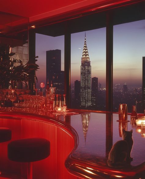 ✨🍷 Step into luxury in this stunning penthouse bar! With its rich 80s decor, dimly lit ambiance, and a mesmerizing view of the New York City skyline, it's the perfect spot to unwind. 🌆🕯️ The dark wood and marble blend seamlessly with velvet seating and vintage glassware, creating an air of opulence that's simply irresistible. 🥂✨ Don't forget to spot the charming grey cat lounging on the floor, ... New York Penthouse Luxury, Penthouse Bar, Curved Counter, 80s Modern, Penthouse View, New York Penthouse, Cozy Bar, 80s Decor, Red Bar