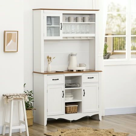 Space always seems precious in the kitchen, so solve that problem with our kitchen buffet and hutch from HomCom. This kitchen pantry features a rustic tone and recessed paneling accents with antiqued metal hardware for a farmhouse look. The two drawers, five open shelves, and three-door cabinets offer plenty of space for you to store canned goods, cutlery, and kitchen appliances. Size: 42.25" x 15.75" x 71".  Color: White. Beadboard Door, Buffet With Hutch, Buffet And Hutch, Storage Hutch, Plate Organizer, Coffee Station Kitchen, Dining Hutch, Countertop Shelf, Storage Pantry