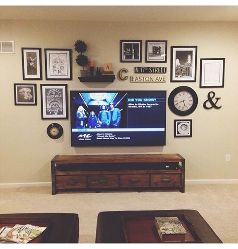 Gallery wall behind tv Picture Wall Behind Tv, Frames Behind Tv, Picture Wall With Tv Living Room, Picture Wall Ideas Above Tv, Picture Wall Ideas Around Tv, Pictures Above Tv Ideas, Photo Wall Above Tv, Hanging Pictures Around Tv, Frames Above Tv