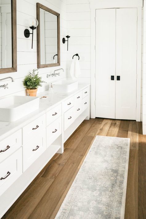 Modern Farmhouse Bathroom White Vanity, Modern Farmhouse Freestanding Tub, Guest Bathroom Modern Farmhouse, Light Wood Floors Bathroom, White Vanity Wood Floor, Bathroom Remodel Wood Floor, Lvp Bathroom Floors, Bathrooms With Wood Floors, Master Bath Farmhouse Style