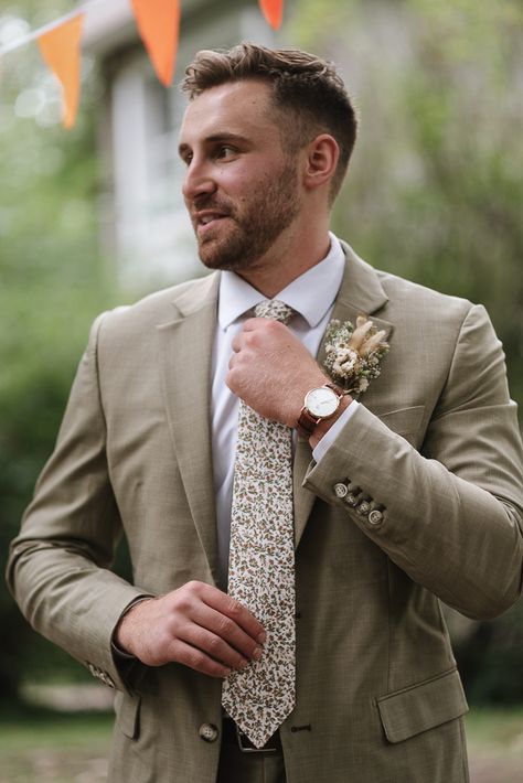 Lakeside Summer Camp Wedding with DIY Details | Junebug Weddings Floral Tie Groom, Tan Suit Wedding, Floral Tie Wedding, Summer Camp Wedding, Honey Photography, Neutral Wedding Colors, Tan Wedding, Tan Suit, Groom And Groomsmen Attire