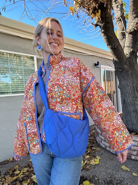 Feeling blue today!💙😄 loving this pairing or oranges with blues as I pair the Chloe quilt jacket with the Streetlevel bag! The perfect Bag and coat combo! Floral pops of color complement the pop of coloer quilted bag. Free People Nordstrom Follow my shop @Liv_a_Little on the @shop.LTK app to shop this post and get my exclusive app-only content! #ootd #style #streetstyle #LTKitbag @shop.ltk https://liketk.it/4sjVK #liketkit #LTKGiftGuide #LTKfindsunder50 #LTKitbag @shop.ltk https://liketk.it/4sjVK Chloe Jacket Free People, Pop Of Orange Outfit, Quilted Floral Jacket, Floral Quilted Jacket, Free People Quilted Jacket Outfit, Quilted Bag Outfit, Quilt Jacket Outfit, Floral Jacket Outfit, Quilted Jacket Street Style