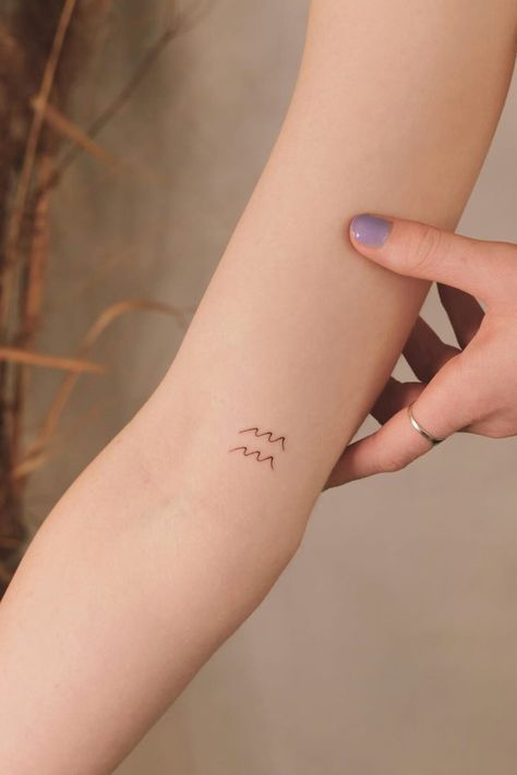 Aquarius Tattoo Glyph, Aquarius Simple Tattoo, Aquarius Hand Tattoo, Tiny Tattoo Locations, Aquarius Wave Tattoo, Minimalist Aquarius Tattoo, Aquarius Minimalist Tattoo, Small Aquarius Tattoo, Glyphs Tattoo