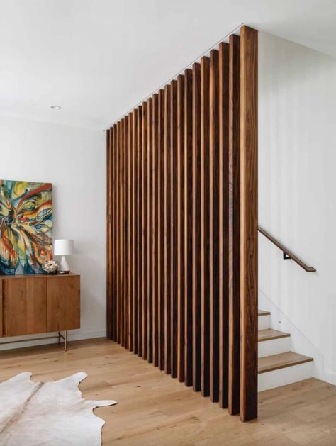 This bright and airy Texas home is focused on sustainable living Mcm Railing, Mcm Staircase, Stacked Stairs, Living Room With Stairs Layout, Slat Stairs, Room Division, Case Study Houses, House Staircase, Entry Stairs