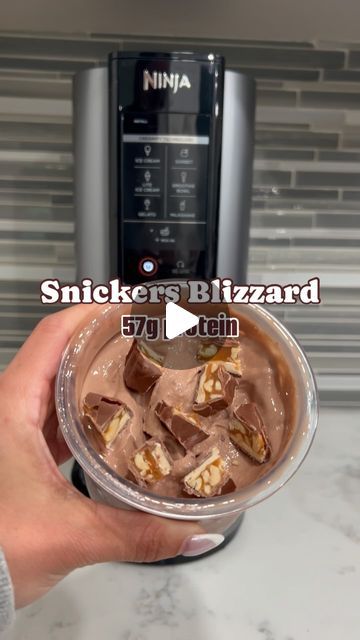 ANN & LO | Minny Hustlers on Instagram: "Comment ‘PROTEIN’ for the delicious creamy hot chocolate protein used 😋  Try this homemade Snickers Blizzard with your Ninja Creami and let us know what you think! 🤤🤤🤤🤤   Macros for the base: 57g of protein, just 14g of carbs, and 6g fat for a total of 333 calories - this treat doesn’t just taste indulgent, it fuels your gains too! 😤💪  Toppings? Go ahead, treat yourself; you’ve earned it. 🌟   #HighProtein #NinjaCreamiRecipe #NinjaCreami" Chocolate Creami Protein, Ninja Creami Snickers Ice Cream, Chocolate Fairlife Ninja Creami, Hot Chocolate Protein, Snickers Protein, Ninja Ice Cream Recipe, Creamy Hot Chocolate, Snickers Ice Cream, Chocolate Frosty