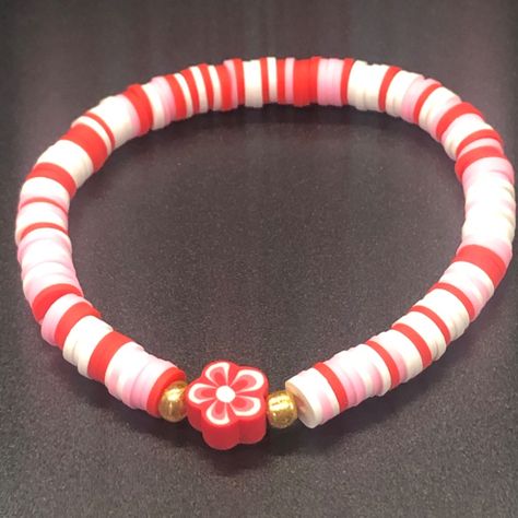 Read & See All Photos! Hand Crafted Flower Hawaiian Clay Bead Bracelet These Handmade Bracelets Are Stretchable So Will Fit Most Children’s And Adults Wrist Sizes Comfortably. Size: Os (7" Inch Stretchable Elastic) Multi Color: Red, Pink & White (Color May Vary Slightly Due To Lighting) ***Sold Separately*** Tags: #Christmasgift #Gift #Giftforhim Same/Next Day Shipping! Thanks For Stopping By My Poshmark Closet! Red Heishi Bracelet, Strawberry Clay Bracelet, Tennessee Clay Bead Bracelets, Light Pink Clay Bead Bracelet, Clay Bead Bracelet Aesthetic, Clay Bead Bracelet Ideas With Pearls, Red Clay Bead Bracelet, Clay Bead Bracelet Ideas Christmas, Preppy Clay Bead Bracelets