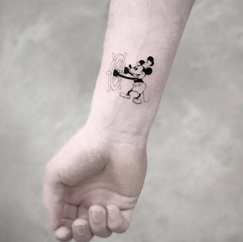 Mickey Mouse tattoo on the wrist. Nicole Tattoo, Tiny Disney Tattoo, Minnie Tattoo, Tattoo On The Wrist, Mouse Tattoo, Mickey Tattoo, Mickey Mouse Tattoo, Disney Sleeve Tattoos, Cute Simple Tattoos