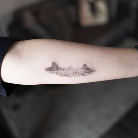 Monument Valley tattoo on the left inner forearm. Monument Valley Tattoo, Cosmic Tattoos, Desert Tattoo, Mountain Tattoos, Valley Tattoo, Skyline Tattoo, Cosmic Tattoo, Compass Rose Tattoo, Coordinates Tattoo