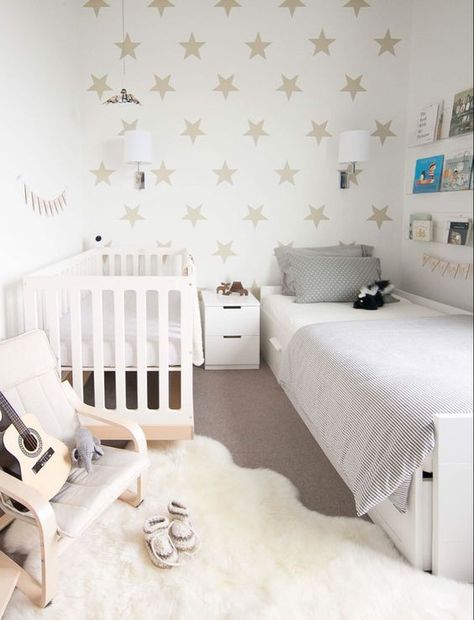 Simply toddler and baby shared room with stars on one wall Toddler And Baby Room, Boy And Girl Shared Bedroom, Kids Rooms Shared, Shared Girls Room, Kids Shared Bedroom, Shared Kids Room, Storage Kids Room, Shared Bedroom, Shared Room