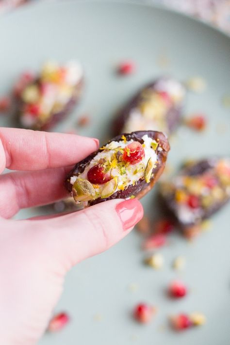 Goat's Cheese Stuffed Dates with Pistachios and Pomegranate | Taste and Tipple Goat Cheese Stuffed Dates, Cheese Stuffed Dates, Ramadan Recipe, Vegan Food Photography, Stuffed Dates, Appetizer Platters, Fish Pie, Pizza Rolls, Cheese Stuffed