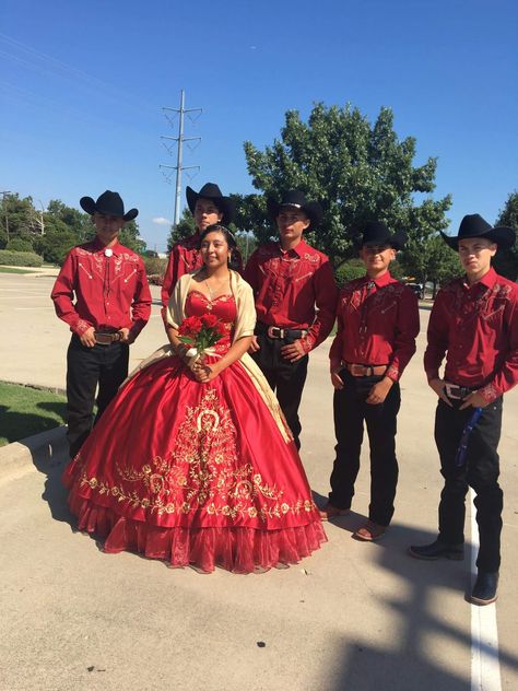 Red Quince Dress With Chambelanes, Quince Chambelanes Outfits Vaquero, Dama Charro Dresses, Quince Chambelanes Outfits Charro, Maroon Quinceanera Chambelanes, Mexican Quinceanera Chambelanes, Damas Dresses For Quince Red And Black, Quince Charro Chambelanes, Red Quince Outfits