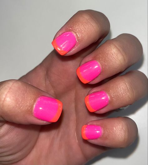 Pink SNS nails with orange gel tips color block summer 2022 Pink Nail Orange French Tip, Pink Nails Orange Tip, Pink Nails With Orange Tips, Creative Summer Nails, Pink And Orange Pedicure, Pink And Orange French Nails, Hot Pink Orange Nails, Pink And Orange French Tip Nails, Bright Pink And Orange Nails