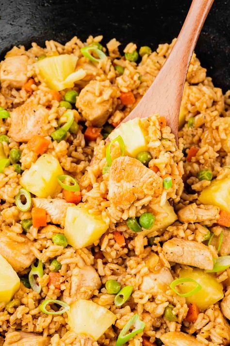 Pineapple Chicken Fried Rice is the perfect balance of sweet and savoury with pineapple chunks, diced chicken breast pieces and rice all seasoned with soy sauce, hoisin sauce and toasted sesame oil. Pineapple Fried Rice Easy, Easy Healthy Chicken Fried Rice, Hawaiian Chicken Fried Rice, Chicken Fried Rice With Pineapple, Chicken Pineapple And Rice Recipes, Pineapple Fried Rice Recipe Chicken, Pineapple Chicken With Rice, Chicken Pineapple Stir Fry, Chicken And Pineapple Recipes