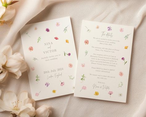 Celebrate your special day with our stunning Wildflower Printable Wedding Invitation, designed to bring a touch of natural beauty and with floral watercolor illustrations, capturing the essence of a blooming garden. This  romantic wedding invitation will remain cherished keepsakes for years to come. After your purchase you will receive a PDF with a link that gives you access to your editable template where you can adjust your own details in Canva. Canva allows you to personalize your printable f White Floral Wedding Invitations, Wildflower Theme Wedding Invitations, Wedding Invites Canva, Wild Flower Wedding Invites, Wildflower Wedding Stationery, Wildflower Wedding Invites, Garden Party Wedding Invitations, Wedding Details Invitation, Wedding Invitations Digital