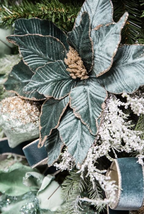 Blue green velvet poinsettias stem Blue Velvet Christmas Tree, Blue Green Christmas Decor, Green And Blue Christmas Tree, Emerald Green Christmas Decor, Blue And Green Christmas Tree, Blue Velvet Christmas, Champagne Tree, Blue Green Christmas, Christmas Chronicles