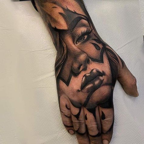 Tattoo Hand Men Style, Gangsta Tattoos For Women Hand, Chicana Hand Tattoos, Chucky Tattoo Hand, Chicano Hand Tattoo, Hand Cover Up Tattoos, Gangsta Clown Tattoo, Chicano Gangster Tattoo Designs, Payasa Tattoo