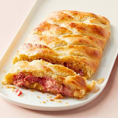 A flaky braid holds a filling of roasted rhubarb and almond paste—and memories of a long-ago lesson in the art and science of puff pastry. Puff Pastry Rhubarb Recipes, Rhubarb Puff Pastry Recipes, Rhubarb Danish, Almond Danish, Strawberry Rhubarb Bars, Danish Braid, Summer Suppers, Lemon Chiffon Pie, Rhubarb Dessert