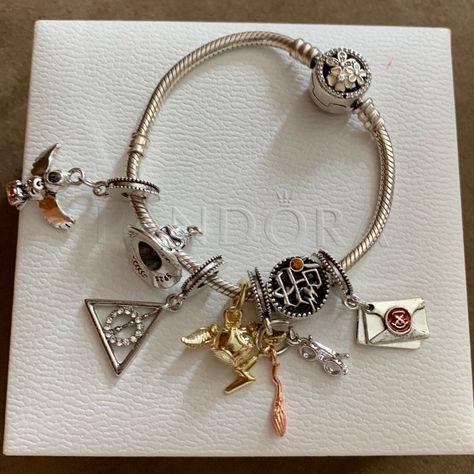 Authentic Pandora Moment Snake Bracelet With Brand New 7 Harry Potter Themed Charms *Poetic Blooms Bracelet Is Authentic Pandora. Sterling Silver 925. It Is Marked S925 Ale. Excellent Condition. Harry Potter Charms Are Non Brand Charms That I Placed On The Bracelet For You. They Are All Brand New. (7 Charms. Please Review All Photos. Very Pretty Bracelet Set. *3 Last Photos Just Showed The Bracelet Without Charms. All Charms Can Be Changed Or Taken Off. Bracelet’s Length Is 6” Harry Potter Pandora Charms, Harry Potter Charm Bracelet, Pandora Harry Potter, Harry Potter Bracelet, Harry Potter Charms, Snake Bracelet, Pandora Silver, Pandora Charm, Pretty Bracelets