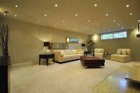 Eliminate any dull corners with evenly placed recessed lights Easy Basement Ceiling, Basement Ceiling Options, Contemporary Family Room, Recessed Lighting Fixtures, Basement Lighting, Led Recessed Lighting, Basement Family Room, Basement Ceiling, Pot Lights