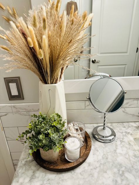 Mix of marble, wood, pampas grass and artificial greenery and chrome accents tie the look of a modern day classic bathroom together Classic Bathroom, Modern Bathroom Decor, Bathroom Inspo, Pampas Grass, Modern Bathroom, Bathroom Decor, Room Decor, Home Decor