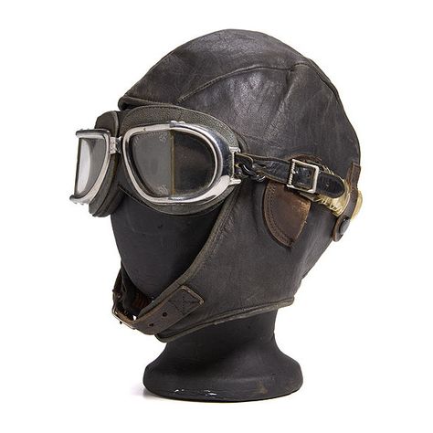 Pre-WWII Commercial Leather Aviator's Cap and Goggles, found on Polyvore Wwi Aircraft, Leather Helmet, Aviator Cap, Chica Punk, Aviator Goggles, Ww1 Aircraft, Steampunk Goggles, Aviator Hat, Neo Victorian