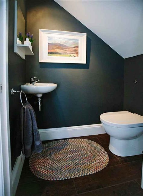 Brilliant Under-Stairs Toilet Ideas (Photos and Tips) | https://www.godownsize.com/toilets-bathroom-built-in-under-staircases/ Understairs Toilet, Room Under Stairs, Toilet Closet, Small Downstairs Toilet, Cloakroom Toilet, Bathroom Under Stairs, Small Toilet Room, Escalier Design, Toilet Sink