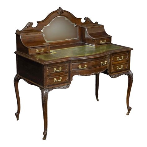 A very attractive ladies writing desk from the late Victorian period. Made from solid mahogany and very much in the Rocco style. Sat on cabriole legs with carved shoulder and apron, slightly bowed to the central drawer and with matching storage slopes to the writing surface. To the recessed back there is a mirror. Victorian Writing Desk, Antique Room Decor, Victorian Style Furniture, Dark Wood Desk, Victorian Vanity, Victorian Desk, Ladies Writing Desk, Antique Writing Desk, Brown Desk