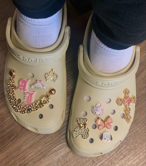 Tan Crocs With Charms, Crocs Charms Aesthetic, Croc Charms Aesthetic, Decorated Crocs, Croc Aesthetic, Designed Crocs, Tan Crocs, Aesthetic Crocs, Croc Collection