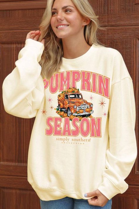 This Simply Southern Pumpkin Season Sweatshirt for Women in Sand delivers cute Fall vibes. The classic crewneck and long sleeves are made from soft fabric, and the graphic is made for anyone in their Fall Pumpkin Era! Features: Simply Southern Style: CREW-TRUCK-SAND Color: Sand Women’s crewneck sweatshirt Long sleeves Fleece lining Ribbed neck, cuffs and hem Front graphic: reads, “Pumpkin Season” with a farm truck with pumpkins Simply Southern logo under graphic Measurements from a size s/xs: Length from center back: 28” Chest: 44” Southern Logo, Truck With Pumpkins, Fall Basics, Youth Shoes, Pumpkin Season, Pumpkin Seasoning, Sweatshirt For Women, Color Sand, Simply Southern