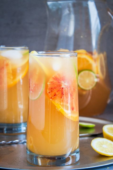 White sangria recipe with agave wheat ale and vibrant citrus Sangria Drink, White Sangria Recipe, Beer Cocktail Recipes, Fruit Sangria, White Wine Sangria, Sparkling Lemonade, Mimosa Recipe, White Sangria, Cooking With Beer