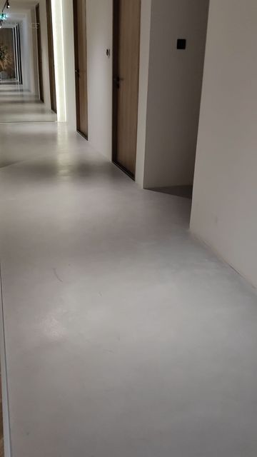 Micro Concrete Flooring, Micro Concrete, Concrete Flooring, Free Aesthetic, Plastic Trim, Durable Flooring, Minimalist Living, Minimalist Living Room, Concrete Floors