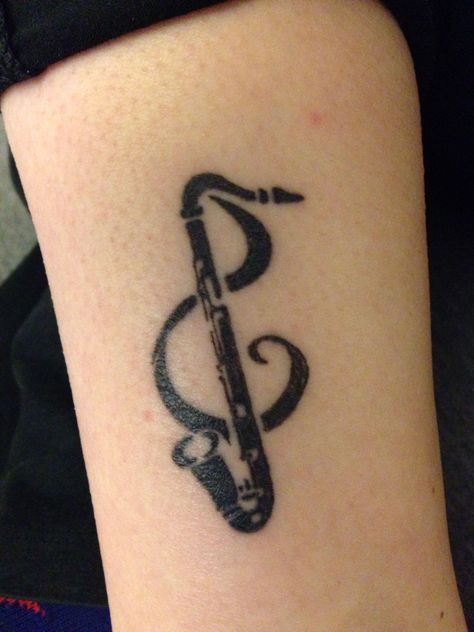 Bass Clarinet Tattoo, Clarinet Tattoo, Music Tats, Saxophone Tattoo, Flute Tattoo, Dumbest Tattoos, Band Silhouette, Fist Tattoo, Family Quotes Tattoos