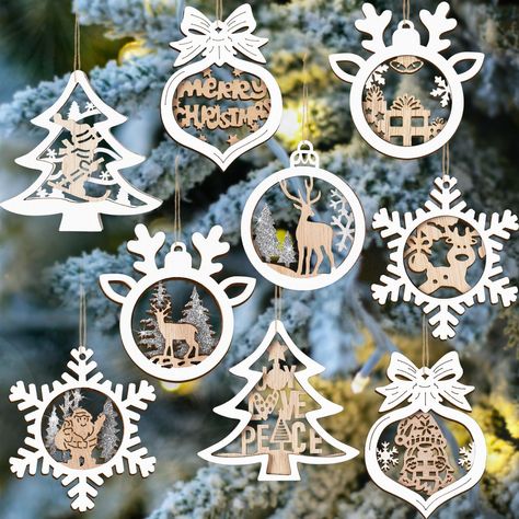 PRICES MAY VARY. VALUABLE PACKAGE:This value package includes 25 different Christmas wooden hanging ornaments in various shapes and sizes, such as Christmas trees, snowflakes, reindeer, hearts, and bells. These visually delightful ornaments will enhance any winter themed display! PREMIUM MATERIAL:Our Christmas hanging decorative ornaments are made of high-quality natural wood, thicker, unfading, shatterproof and reusable. Designed with a 2-layer laser wood cut, these layered scenes offer winter Layered Ornaments, Winter Wonderland Party Theme, Farmhouse Christmas Ornaments, Rustic Christmas Ornaments, Tree Winter, Farmhouse Christmas Tree, Reindeer Decorations, Reindeer Ornaments, Christmas Party Favors