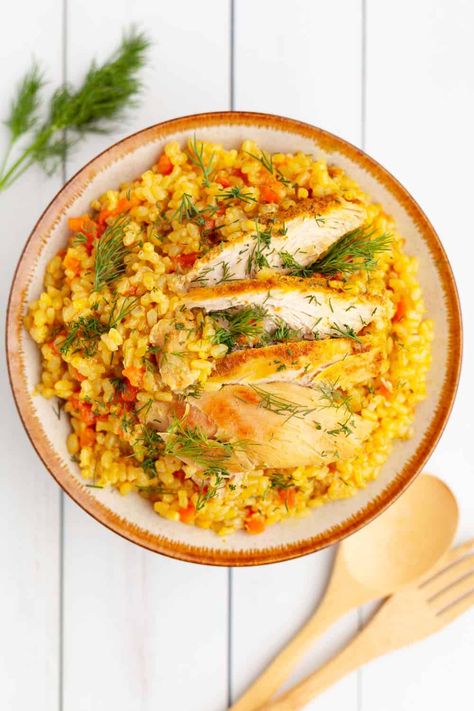 Instant Pot Turmeric Chicken and Rice combines brown rice and chicken thighs into a flavorful, healthy family meal. #instantpot #chicken #turmeric #instantpotchickenthighs #instantpotchickenandrice Turmeric Chicken And Rice, Instant Pot Chicken And Brown Rice Recipes Healthy, Chicken Turmeric Rice, Instant Pot Turmeric Chicken And Rice, Ginger Turmeric Chicken Broth, Chicken And Brown Rice, Delicious Family Dinners, Spiced Chickpeas, Healthy Instant Pot Recipes