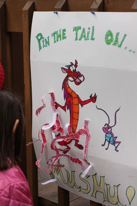 For another game I drew (you can also print from the internet) a Mushu on a poster board for pin the tail on Mushu. Then I cut out enough tails for all the kids. Mulan Party, Tail Ideas, Mulan Birthday, Chinese Party, Pin The Tail, Disney Princess Birthday Party, Themed Dinner, Disney Princess Birthday, Disney Princess Party