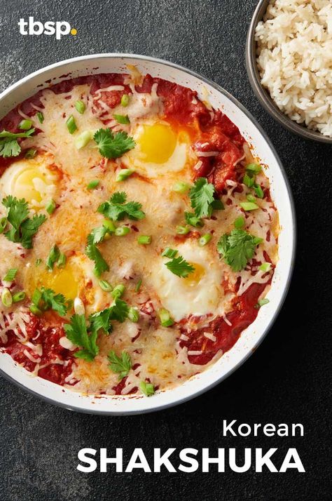 Shakshuka is a Middle-Eastern favorite, but this Korean-inspired version made with kimchi and sesame oil gives it a Southeast Asian spin that makes this breakfast seriously stellar. Kimchi Shakshuka, Korean Breakfast, Middle Eastern Dishes, Korean Recipes, Traditional Recipes, Asian Inspired Recipes, Monterey Jack, Fusion Food, Jewish Recipes