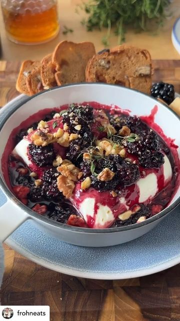 A Taste of the Kawarthas on Instagram: "Jammy Baked Goat Cheese with Blackberry Sangria Jam definitely will be on repeat this Summer!🤤   It’s insanely delicious, so simple to make, and the great part is that you can whip it up in less than 20 minutes making it the perfect summer appetizer!🤌  Share this with someone you would smash this with!🫠  Jammy Baked Goat Cheese with Blackberry  Sangria Jam:   1 cup Blackberries 3 oz Sugar 1/2 cup Red Wine  1 oz Brandy Zest of 1 Orange Flaky Salt 1 Goat Cheese Log 1/4 cup Chopped Walnuts Pinch of Fresh Thyme   Add BlackBerry, sugar, red wine, brandy, orange zest, and flaky salt to a pot and simmer on high until the jam is reduced and registers 220 degrees Fahrenheit on a thermometer. Reserve.   Add goat cheese to a baking dish, spoon over jam, and Sangria Blackberry Jam, Jammy Baked Goat Cheese With Blackberry, Goat Cheese Blackberry Appetizer, Jammy Baked Goat Cheese, Goat Cheese Log, Blackberry Sangria, Blackberry Jam Recipes, Goat Cheese Dip, Holiday Party Appetizers