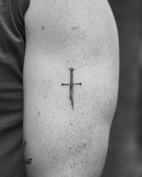 Swords for ever. Thanks Guy . . #lotrtattoo #finelinetattooing #narsil #lotrart #microtattoo Gandalf Tattoo Minimalist, Small Lotr Tattoo Simple, Narsil Lotr, Lord Of The Rings Tattoo Minimalist, Aragorn Tattoo, Lotr Tattoo Minimalist, Small Lotr Tattoos, Evenstar Tattoo, Lotr Tattoo Ideas