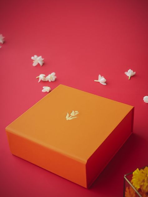 Utsav collection celebrates the traditional Indian hues with a contemporary appeal. Boxes and bags in premium velvet finish paper with gold motif and self texture patterns. The set can be customised as per the sizing and personalisation requirement.
#gifts #packaging #weddinggifts #corporategifts #celebrations #packaging #design Sweet Box Design, Celebration Gifts, Gold Motif, Orange Tulips, Sweet Box, Indian Sweets, Packaging Ideas, Gift Hampers, Box Design