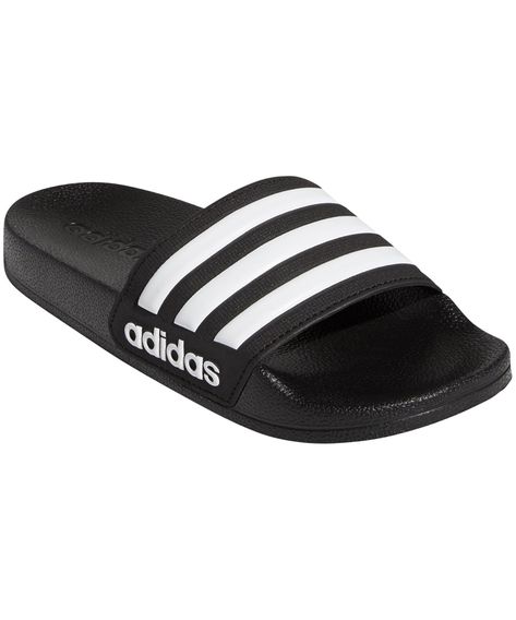 After they swim treat their feet to comfort in these kids' adidas slides. The quick-drying slides have a contoured Cloudfoam footbed that cradles small feet. The 3-Stripes on the bandage offer a touch of style. Adidas Flip Flops, Shower Sandals, Adidas Slides, Black Clouds, Adidas Adilette, White Core, Adidas Kids, Adidas Girl, Boy Shoes