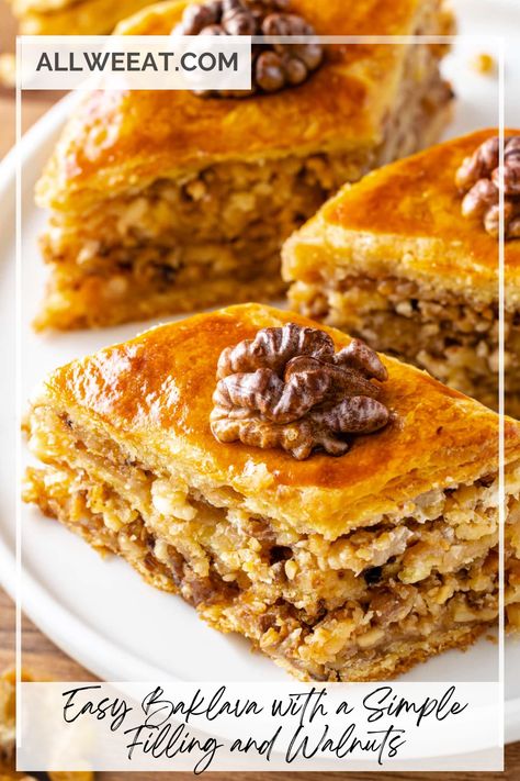 🍯🥮 Treat yourself to this Easy Baklava with a Simple Filling and Walnuts! Layers of flaky phyllo dough, buttery goodness, and a sweet walnut filling, all drizzled with syrup, make this traditional dessert a true delight. Perfect for special occasions or just indulging your sweet tooth, this homemade baklava is easier than you think! 🌟 #BaklavaRecipe #EasyDesserts #WalnutBaklava #PhylloPastry #SweetTreats #HomemadeDessert #MiddleEasternDessert Traditional Baklava Recipe, Easy Baklava, Homemade Baklava, Baklava Recipe Easy, Walnut Dessert, Brie Puff Pastry, Turkish Baklava, Layer Chicken, Middle Eastern Desserts