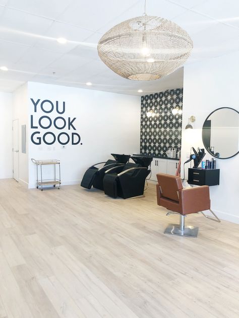 Modern Salon Waiting Area, Hair Salon Chandelier Ideas, I’m Home Hair Salon Ideas, Mid Century Modern Hair Salon Decor, Modern Chic Salon, Trendy Hair Salon Interior, Black And Wood Salon Decor, Salon Entry Ideas, Black And White Hair Salon Decor