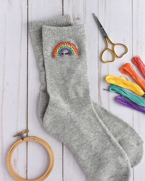 Do you know what you should do this weekend? Embroider rainbows on your socks! 🌈🧦 You can find my pattern and instructions for these in the latest issue of @simplysewingmag (issue 118). Let me tell you…they absolutely make me smile! As an added bonus, you can use your favorite rainbow of embroidery floss to truly make them your own! #embroidery #embroideredclothing #handstitched #instastitch #modernembroidery #kawaiicute #simplysewingmag #stitchupcycle Embrodery Socks, Embroidery On Socks, Sock Embroidery, Socks Embroidery, Embroidered Sweaters, Wild Olive, Embroidered Socks, 2024 Christmas, Embroidered Sweater