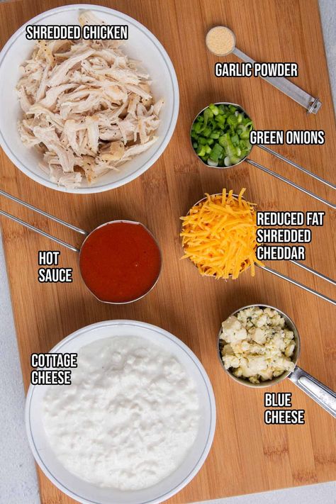 This healthy buffalo chicken dip recipe is made with blended cottage cheese for a high protein, low fat dip that’s packed with flavor. This is a delicious snack or appetizer that's perfect for game day. Bookmark this delicious dip for football season or your next party. One serving (based on 8 total servings) is less than 150 calories and has 5 grams of fat, 5 grams of carbohydrates, and 18 grams of protein. High Protein Superbowl Snacks, Vsg Meal Prep High Protein Low Carb, Blended Cottage Cheese Dip Recipes, Cottage Cheese Based Dip, Protein Party Snacks, Buffalo Chicken Salad With Cottage Cheese, Buffalo Blue Cheese Dip, High Protein Buffalo Chicken Bowl, Buffalo Chicken Dip High Protein